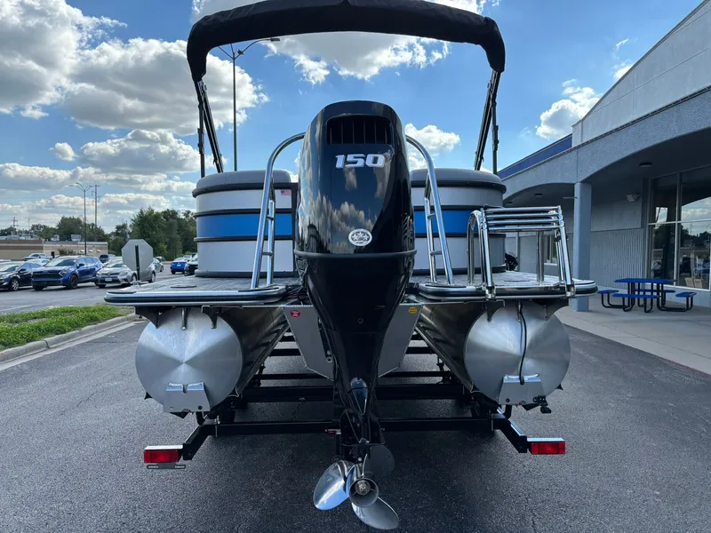 Slide: The Image of Rear view of a 2027 Bentley Pontoons 223 Bolt on a parking lot. - 6