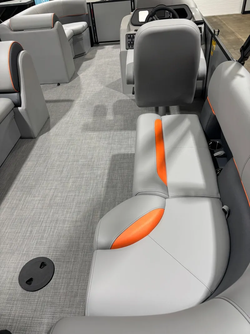Slide: The Image of Interior of 2027 Bentley Pontoons 223 Bolt with gray and orange seating. - 22