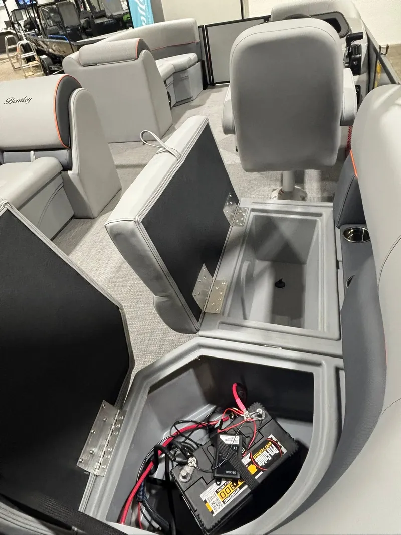 Slide: The Image of Interior of Bentley Pontoons 223 Bolt 2027 with open storage compartments. - 24