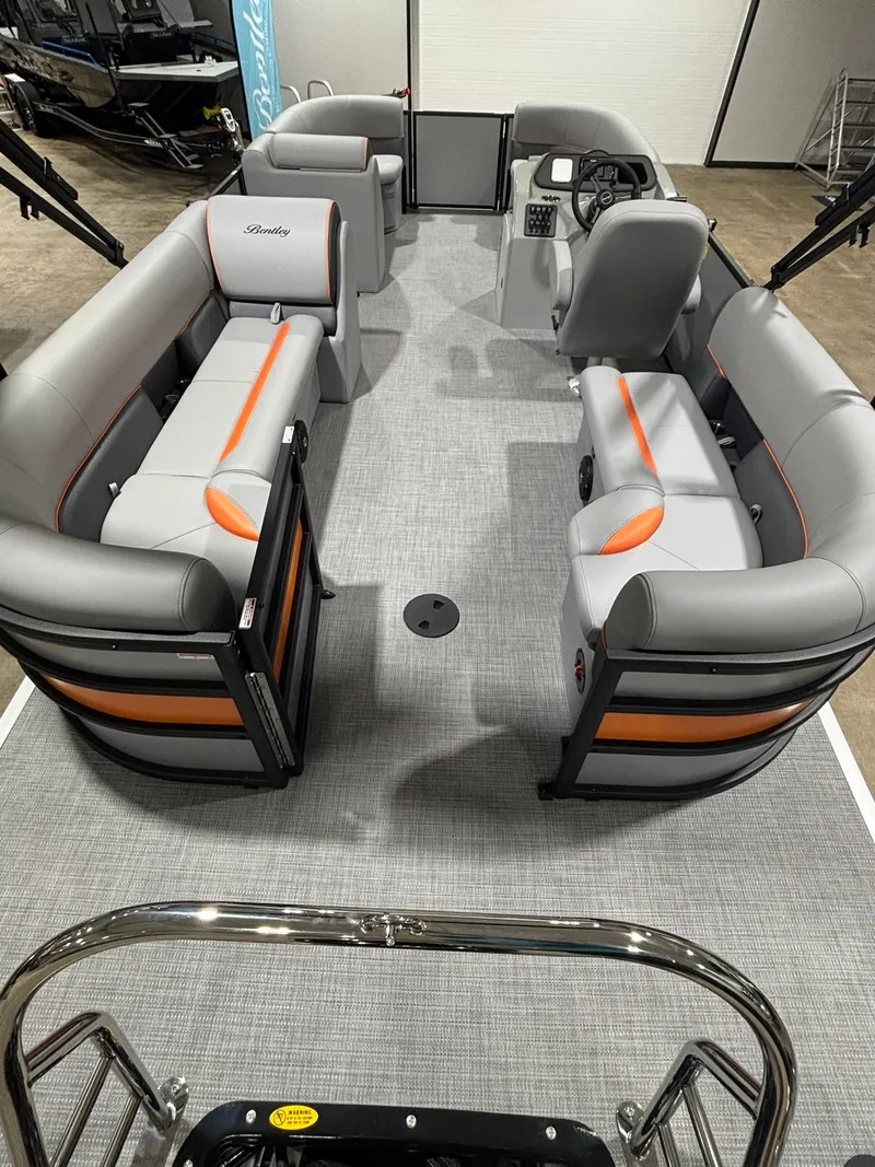Slide: The Image of Interior of 2027 Bentley Pontoons 223 Bolt with gray and orange seating. - 29