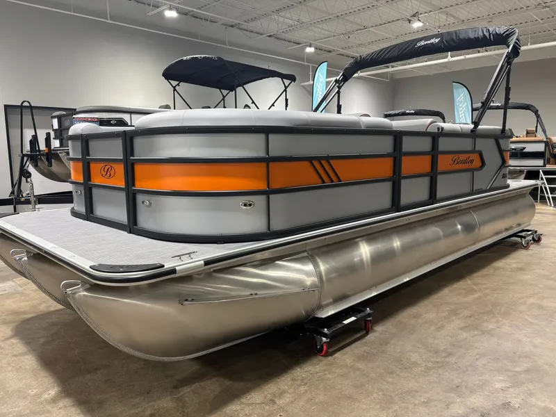 Slide: The Image of 2027 Bentley Pontoons 223 Bolt pontoon boat in showroom. - 3