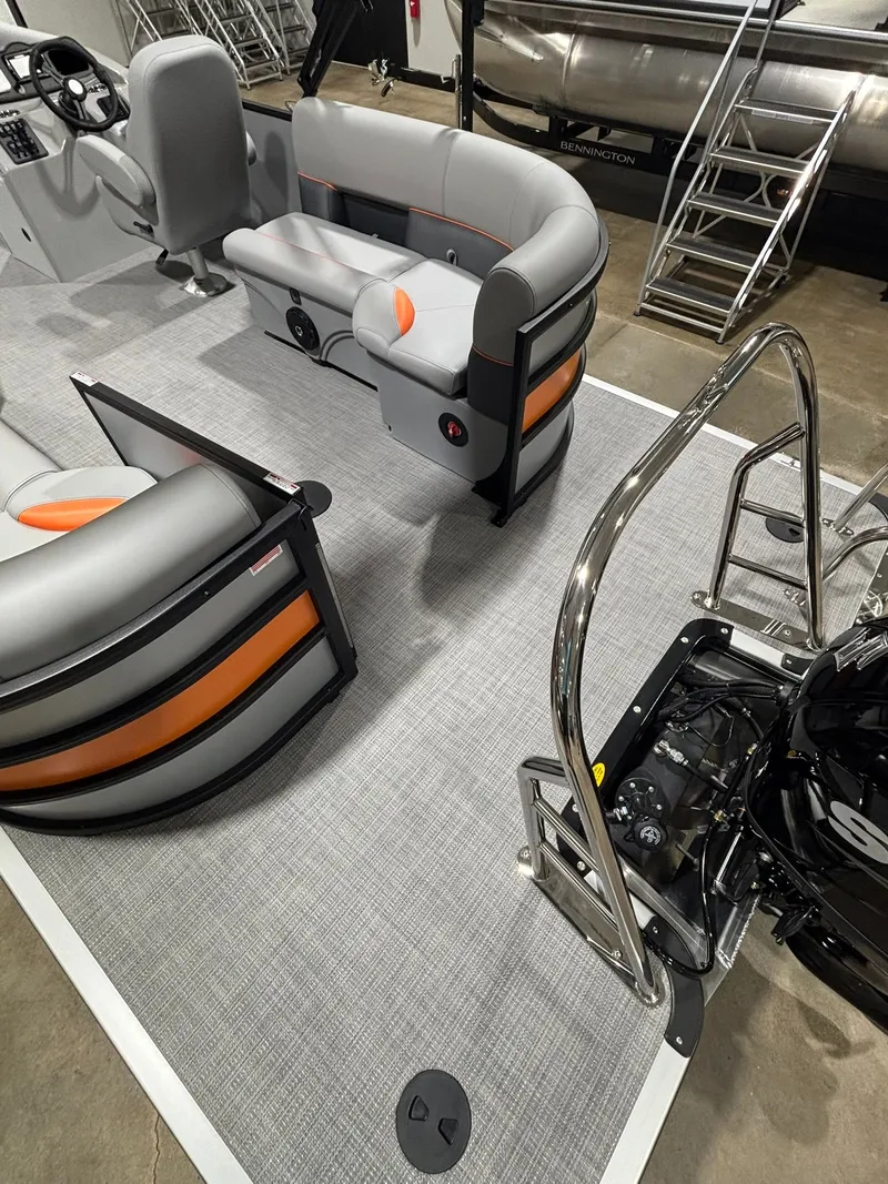 Slide: The Image of Interior of 2027 Bentley Pontoons 223 Bolt with gray and orange seating. - 30