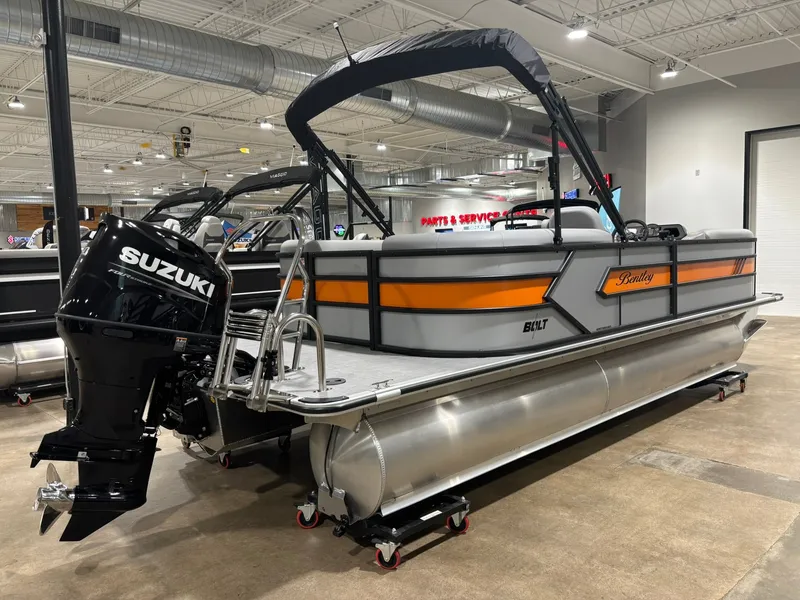 Slide: The Image of 2027 Bentley Pontoons 223 Bolt with Suzuki engine in showroom. - 6