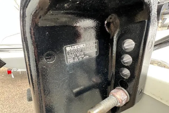 Slide: The Image of Close-up of a Suzuki motor part with identification plate, Savannah SS19, 2021 model. - 18