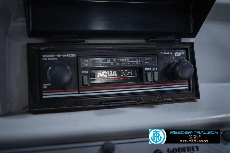 Slide: The Image of Radio system in a 1993 Godfrey SW 180 boat, featuring Aqua Tech controls. - 30