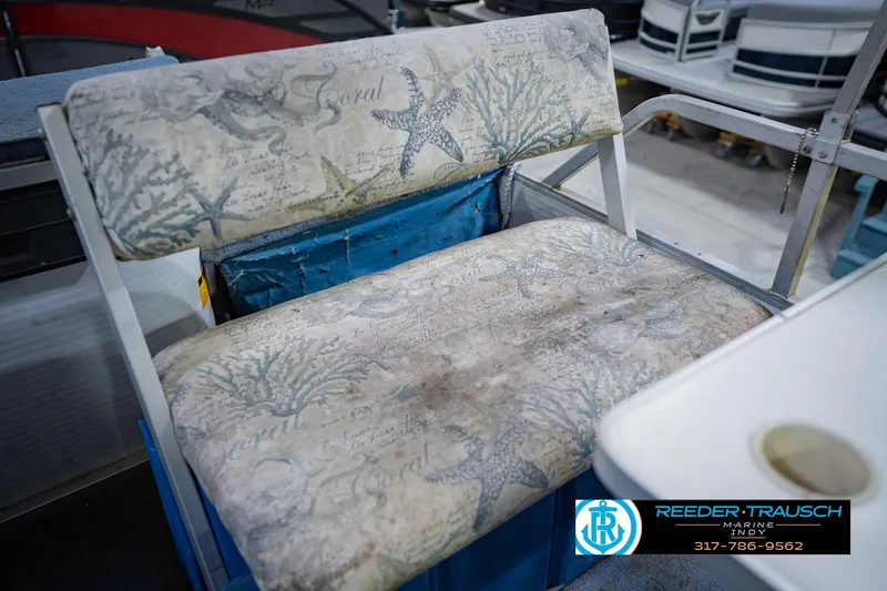 Slide: The Image of Vintage 1993 Godfrey SW 180 boat seat with coral and starfish design upholstery. - 34