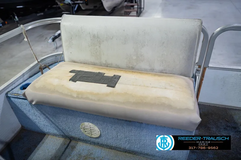 Slide: The Image of Worn seat on a 1993 Godfrey SW 180 boat with duct tape repair. - 35
