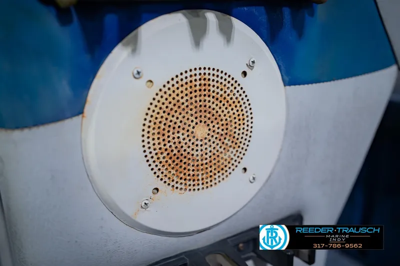 Slide: The Image of Rusty speaker grill on a 1993 Godfrey SW 180 boat, Reeder Trausch Marine logo visible. - 36