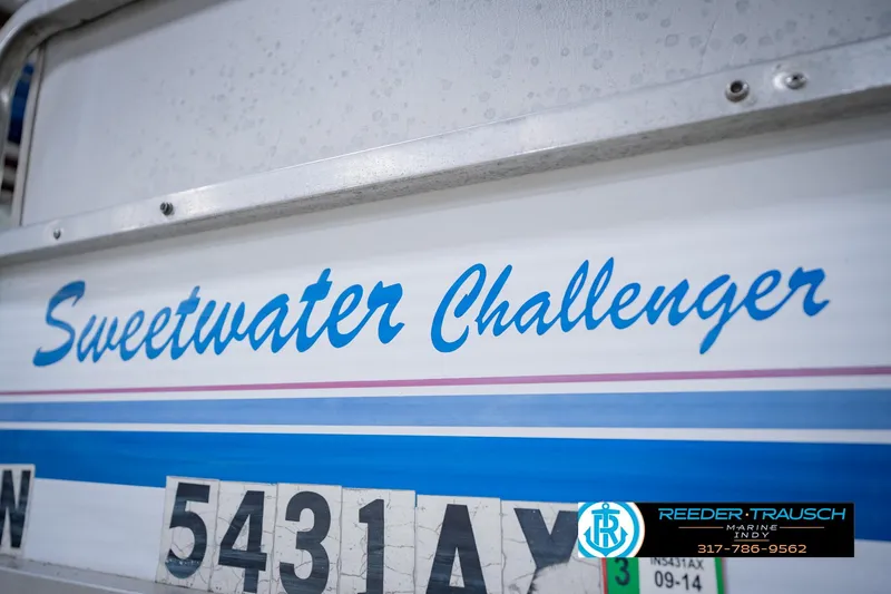 Slide: The Image of 1993 Godfrey SW 180 Sweetwater Challenger boat with registration number 5431AX. - 44