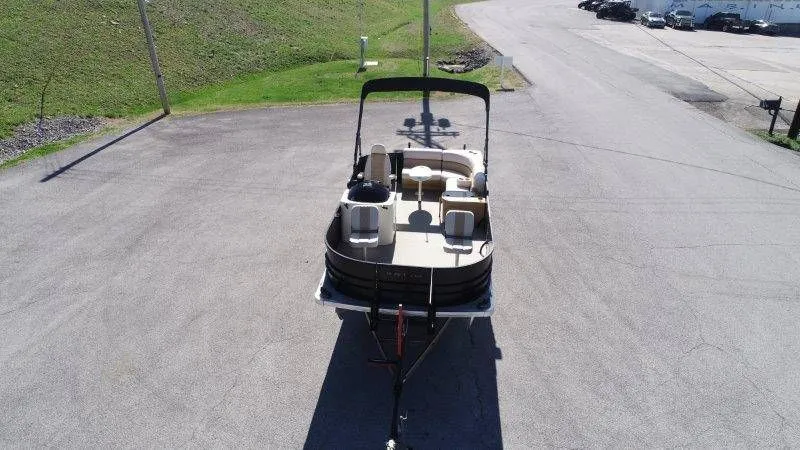 Slide: The Image of 2018 Lexington 5 Series pontoon boat on parking lot. - 10