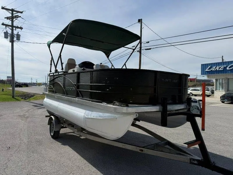 Slide: The Image of 2018 Lexington 5 Series pontoon boat on trailer, side view. - 17