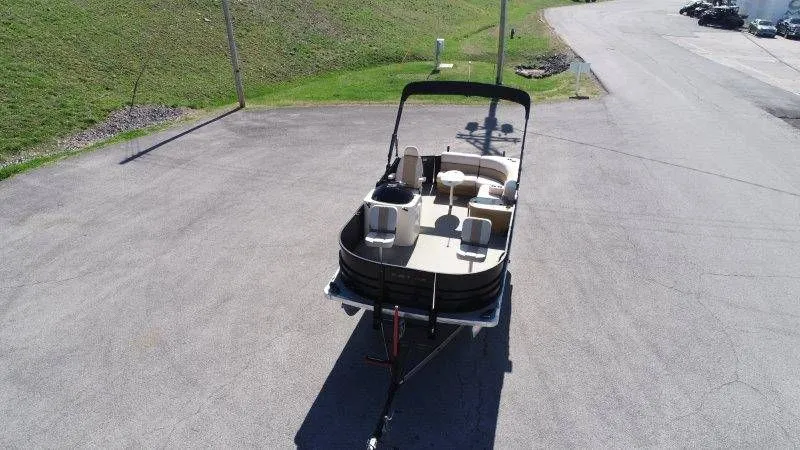 Slide: The Image of Aerial view of a 2018 Lexington 5 Series pontoon boat on asphalt. - 18