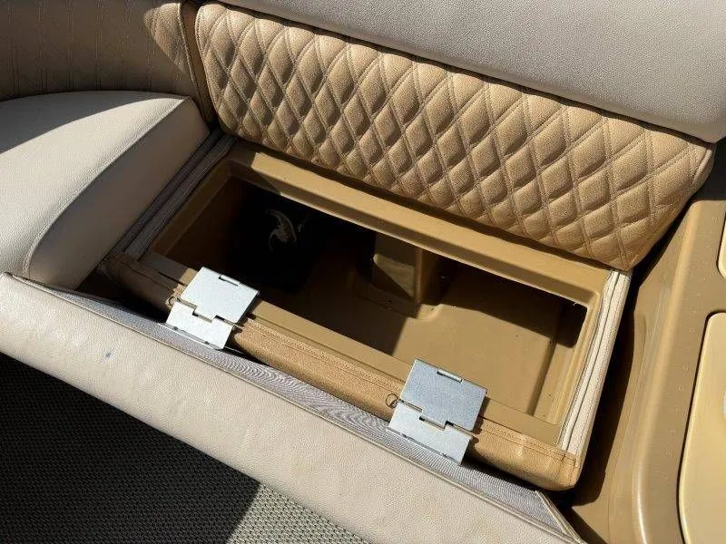 Slide: The Image of Open seat storage compartment in 2018 Lexington 5 Series. - 25