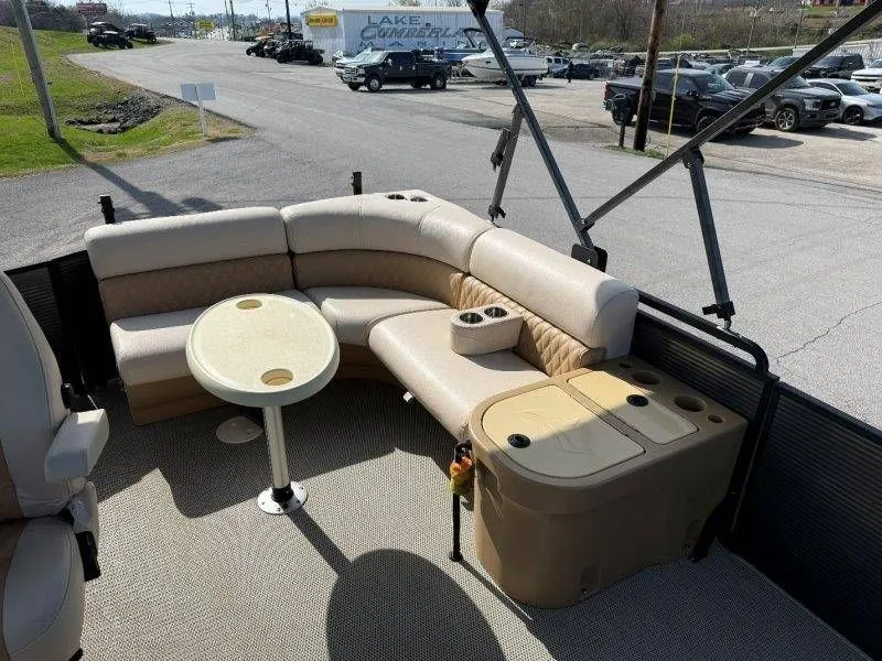 Slide: The Image of Interior of a 2018 Lexington 5 Series pontoon boat with seating area. - 26