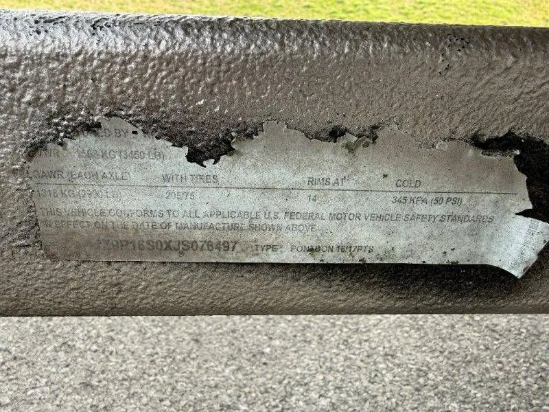 Slide: The Image of Worn vehicle label on Lexington 5 Series 2018. - 29