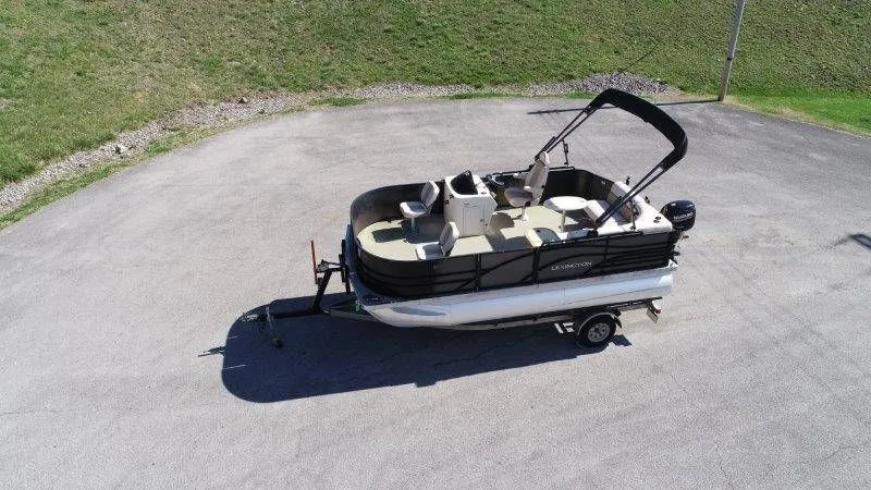 Slide: The Image of Aerial view of 2018 Lexington 5 Series pontoon boat on trailer. - 3