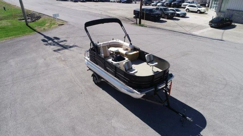 Slide: The Image of Aerial view of a 2018 Lexington 5 Series pontoon boat on a trailer. - 32