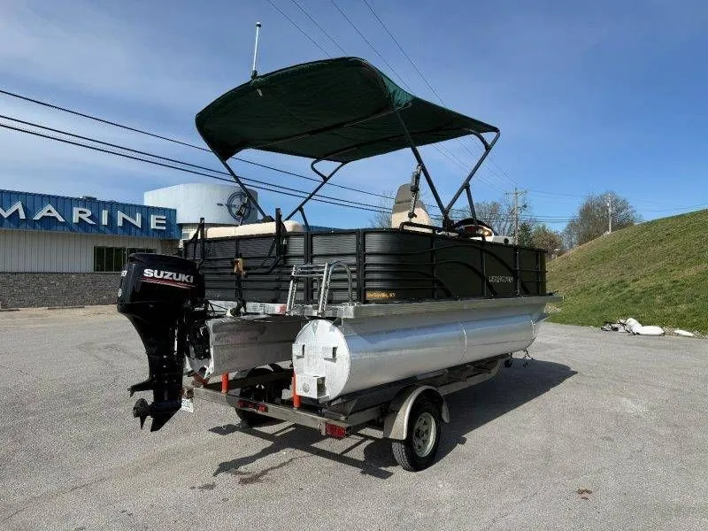 Slide: The Image of 2018 Lexington 5 Series pontoon boat with Suzuki outboard motor. - 37