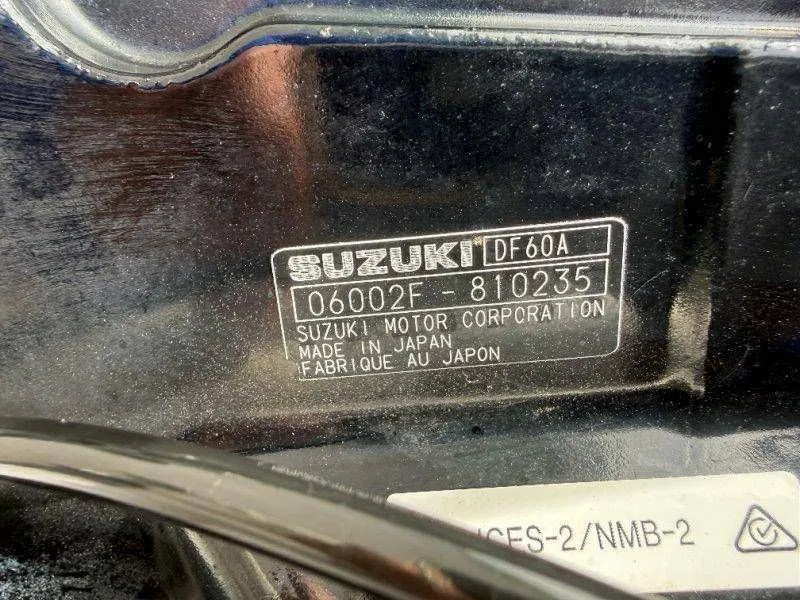 Slide: The Image of Suzuki DF60A engine plate, made in Japan, serial number 06002F-810235. - 39