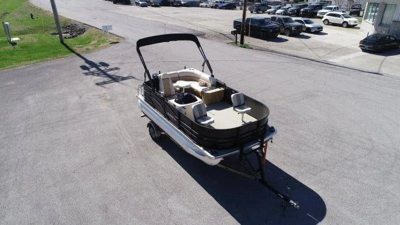Slide: The Image of Aerial view of a 2018 Lexington 5 Series pontoon boat on a trailer. - 40