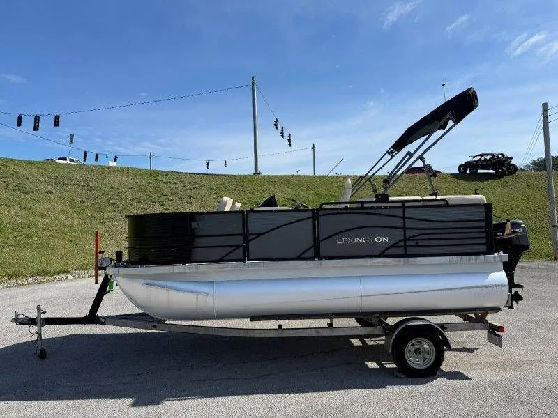 Slide: The Image of 2018 Lexington 5 Series pontoon boat on trailer, side view. - 48