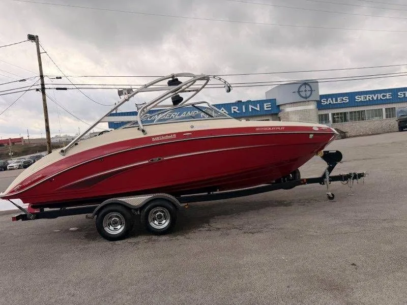 Slide: The Image of Red 2014 Yamaha 242 Limited S boat on trailer. - 14