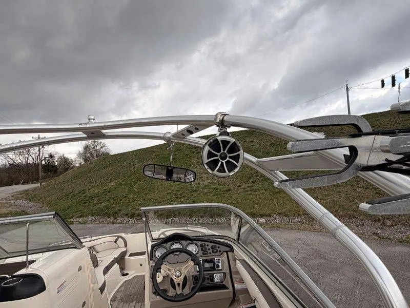 Slide: The Image of Yamaha 242 Limited S 2014 boat cockpit with speaker and controls. - 19
