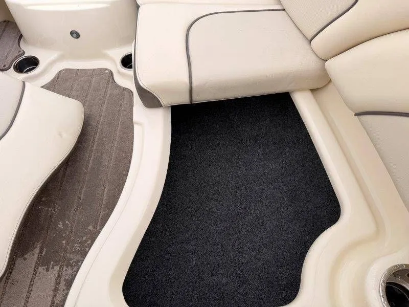 Slide: The Image of Interior of a 2014 Yamaha 242 Limited S boat with beige seating. - 20
