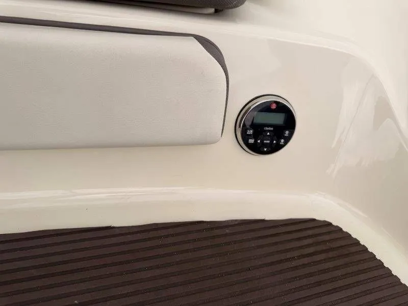 Slide: The Image of Yamaha 242 Limited S 2014 boat console with controls. - 23