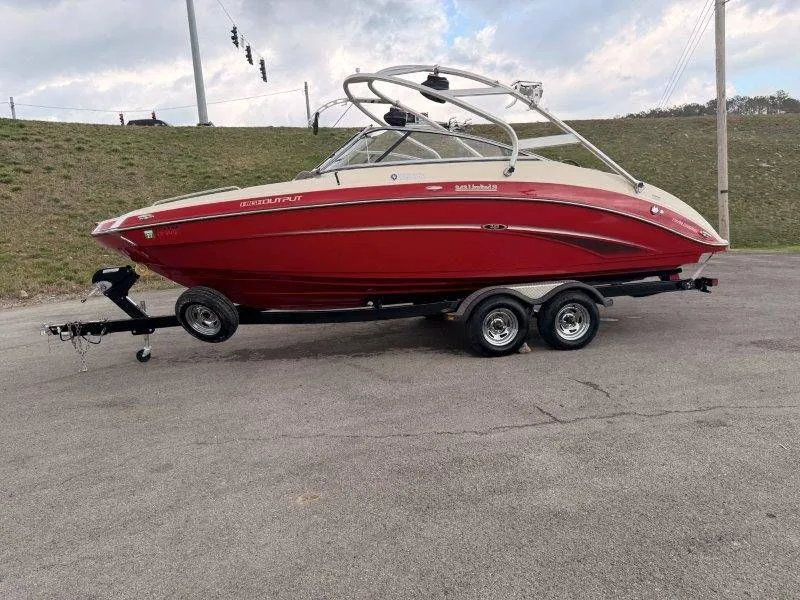 Slide: The Image of Red 2014 Yamaha 242 Limited S boat on trailer. - 3