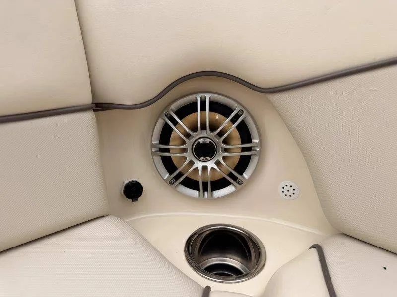 Slide: The Image of Speaker and cup holder in Yamaha 242 Limited S boat, 2014 model. - 32
