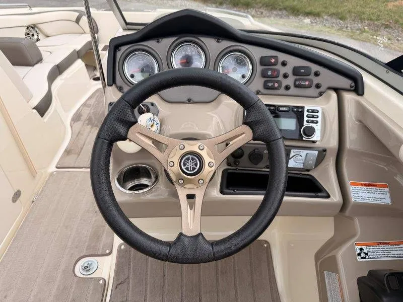Slide: The Image of Yamaha Boats 242 Limited S 2014 steering console with wheel and gauges. - 34
