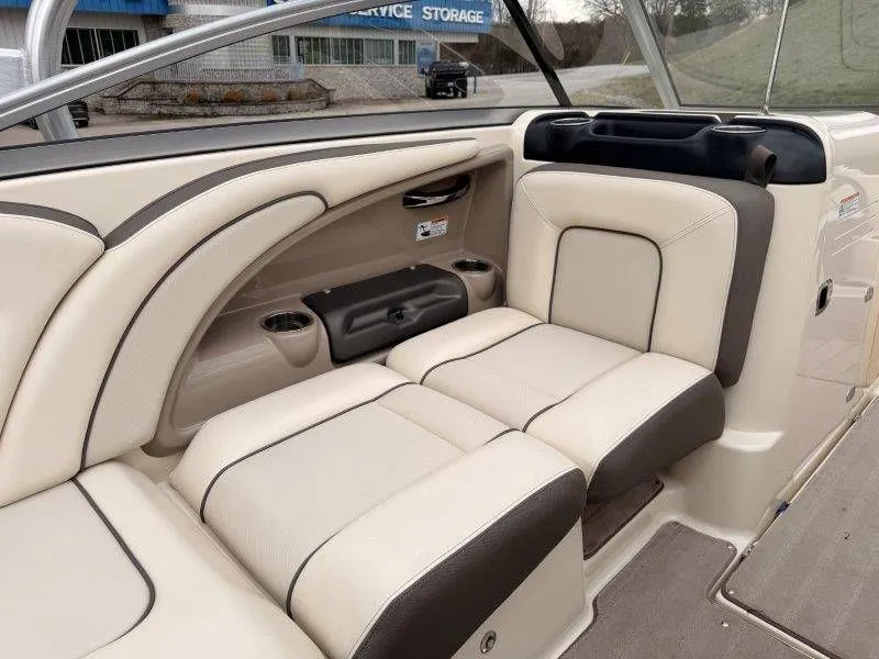 Slide: The Image of Interior of a 2014 Yamaha 242 Limited S boat with beige seating. - 36