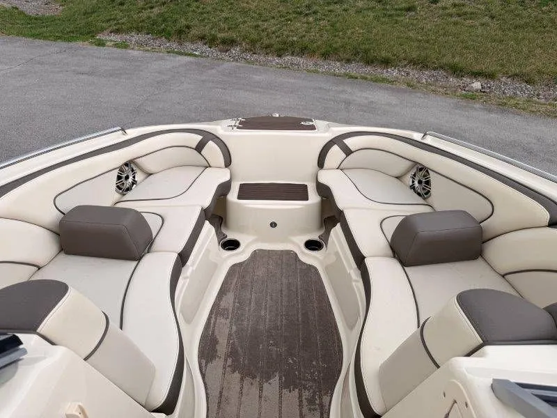 Slide: The Image of Interior of a 2014 Yamaha 242 Limited S boat with beige seating. - 37
