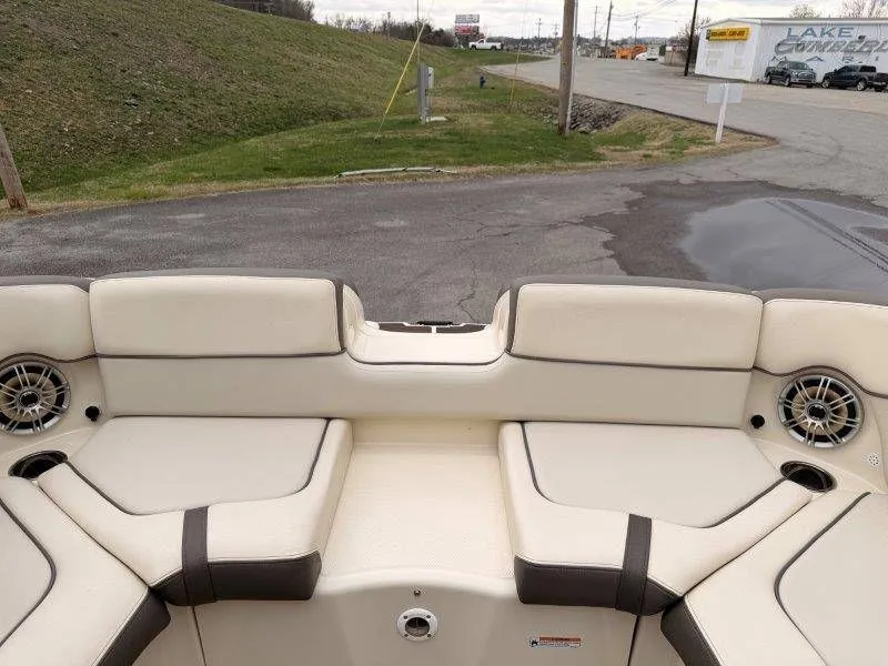 Slide: The Image of Interior of a 2014 Yamaha Boats 242 Limited S with beige seating. - 43