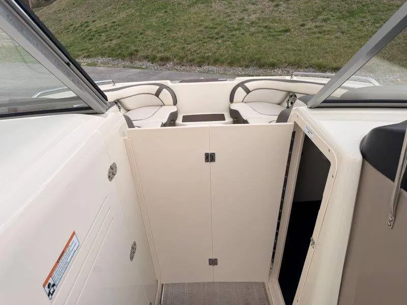 Slide: The Image of Interior of a 2014 Yamaha Boats 242 Limited S with seating area. - 45