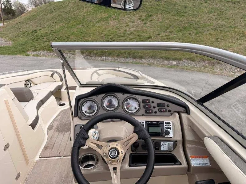 Slide: The Image of Yamaha Boats 242 Limited S 2014 cockpit with steering and dashboard. - 46