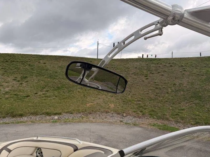 Slide: The Image of Rearview mirror of a 2014 Yamaha 242 Limited S boat. - 47