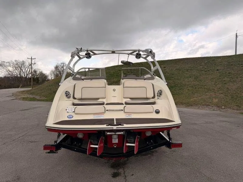 Slide: The Image of Rear view of a 2014 Yamaha Boats 242 Limited S on trailer. - 6