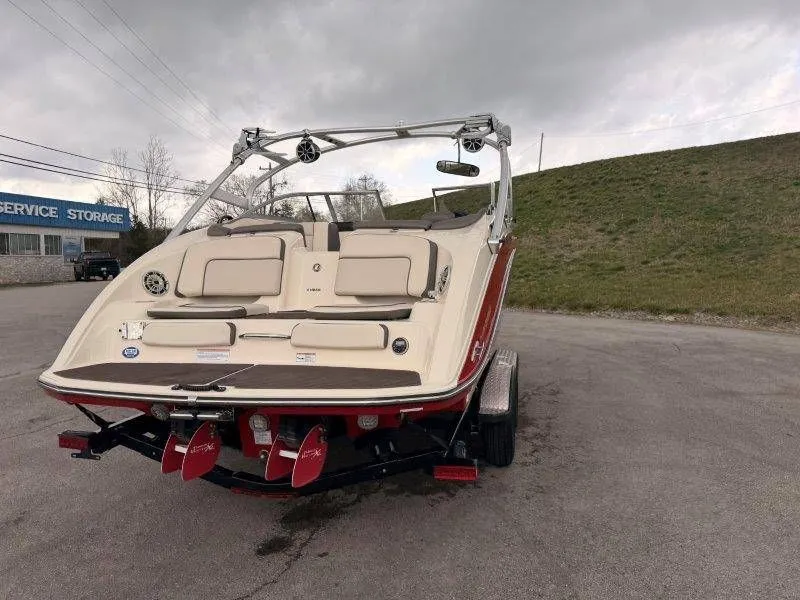Slide: The Image of 2014 Yamaha Boats 242 Limited S on trailer, rear view. - 7