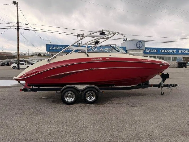 Slide: The Image of Red 2014 Yamaha Boats 242 Limited S on trailer. - 8