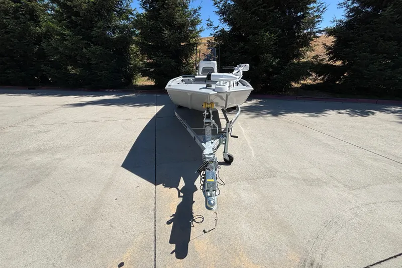 Slide: The Image of 2026 Tracker Bass Tracker Classic CC boat on trailer in outdoor setting. - 21