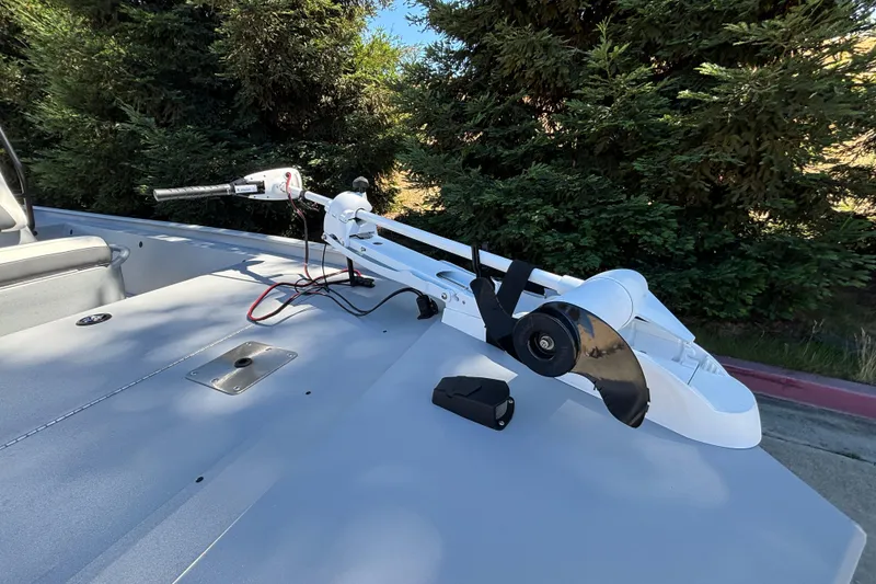 Slide: The Image of 2026 Tracker Bass Tracker Classic CC boat with trolling motor on deck. - 29