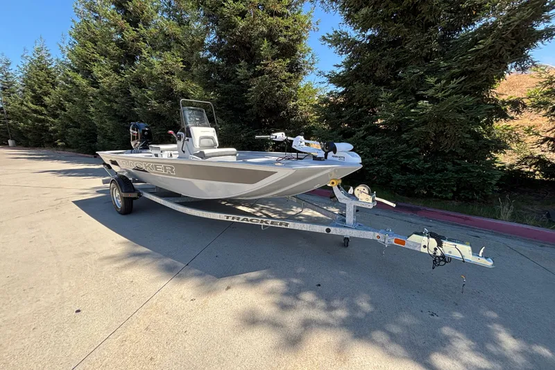 Slide: The Image of 2026 Tracker Bass Tracker Classic CC boat on trailer, parked outdoors. - 3