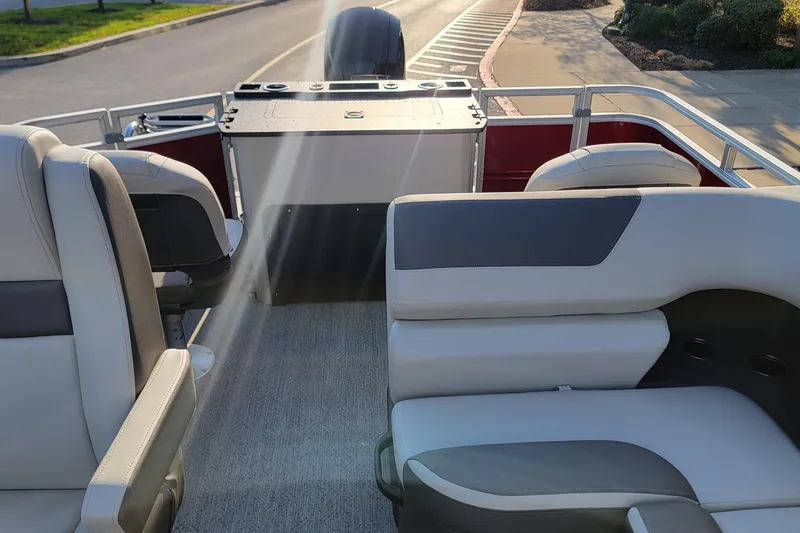 Slide: The Image of Interior view of 2026 Sun Tracker Party Barge 22 XP3 with comfortable seating. - 87