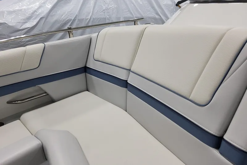 Slide: The Image of Luxurious seating in the 2026 Formula 330 Crossover Bowrider OB boat interior. - 28