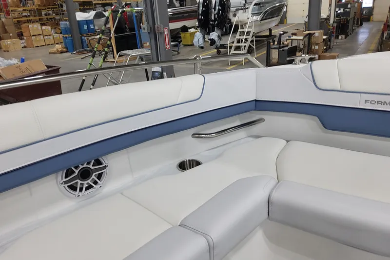 Slide: The Image of 2026 Formula 330 Crossover Bowrider OB interior with sleek seating and modern design. - 32