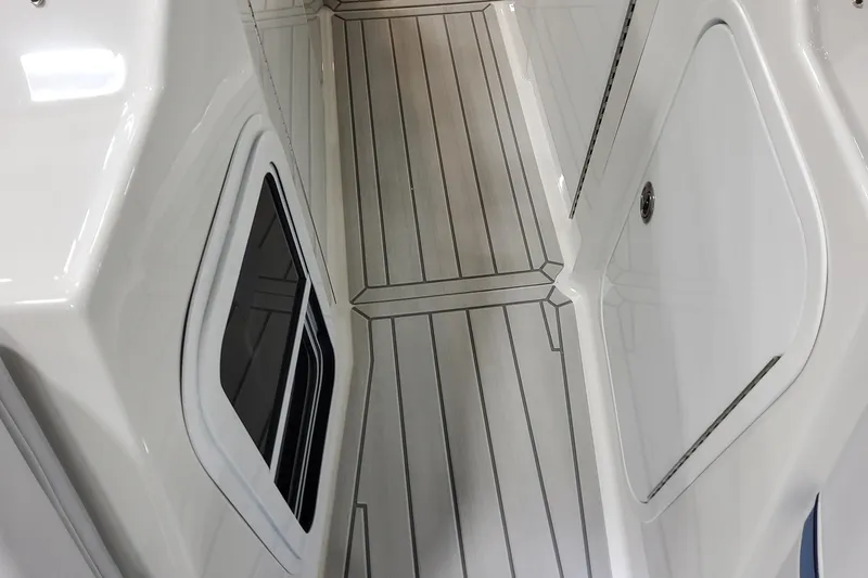 Slide: The Image of 2026 Formula 330 Crossover Bowrider OB interior with sleek flooring design. - 36