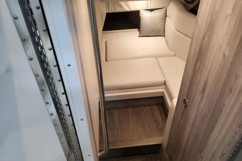 Slide: The Image of Interior cabin of 2026 Formula 330 Crossover Bowrider OB with plush seating. - 44