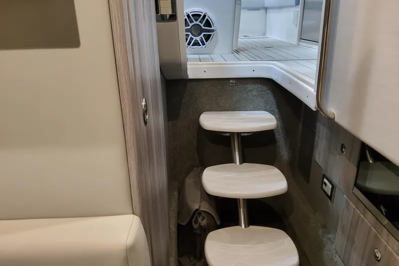 Slide: The Image of Interior view of 2026 Formula 330 Crossover Bowrider OB, featuring sleek steps and modern design. - 48